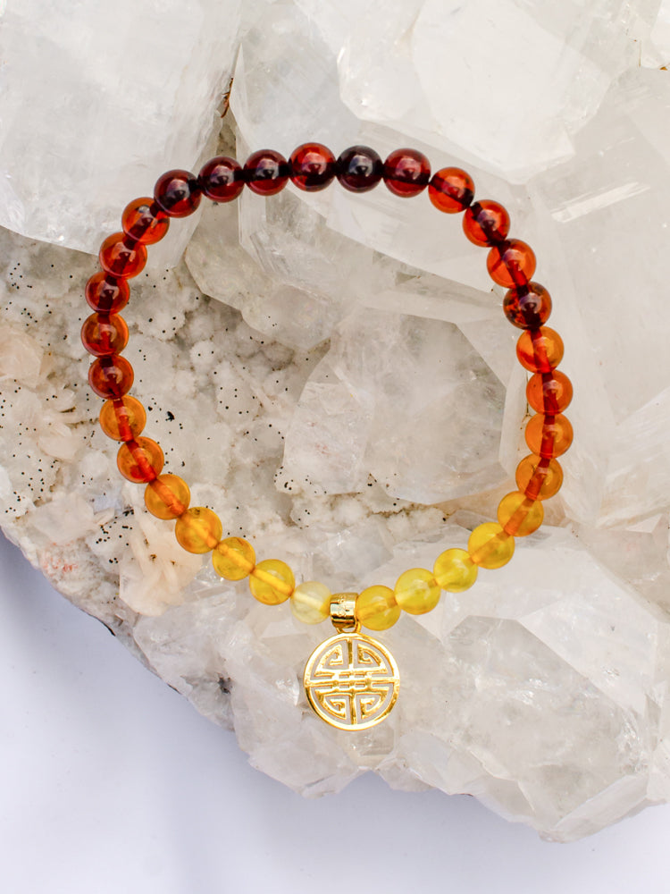Amber simple bracelet with "happiness"