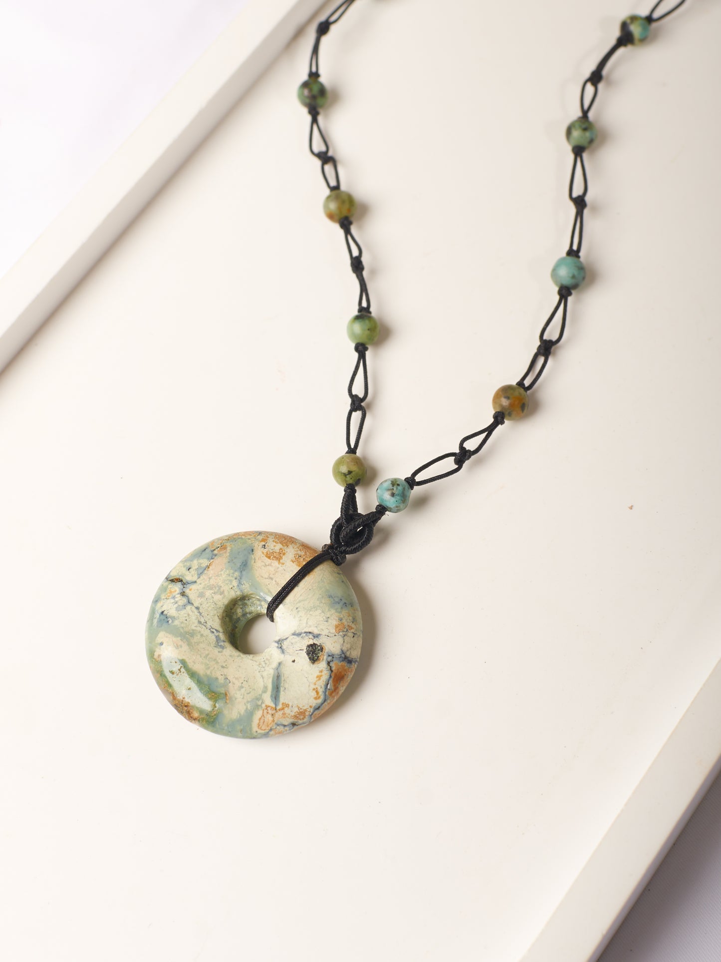 jade donut necklace